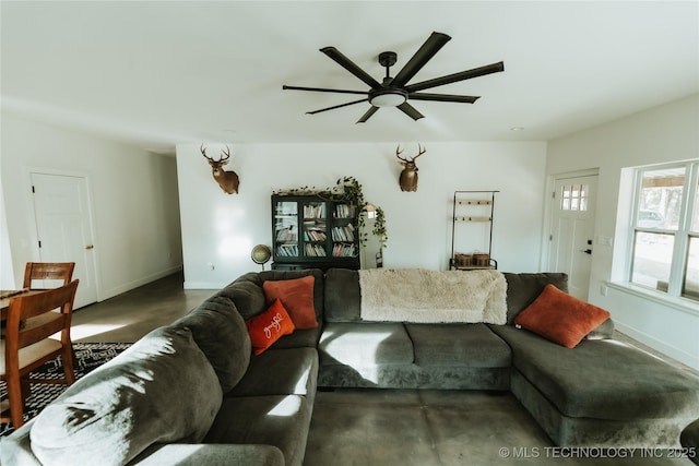 348550 E Parkside Dr, Pawnee, OK 74058 - living area featuring finished concrete flooring and a ceiling fan
