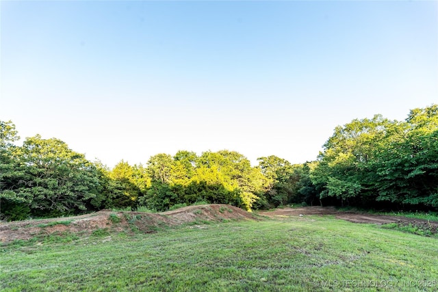 348550 E Parkside Dr, Pawnee, OK 74058 - view of grassy yard featuring a forest view
