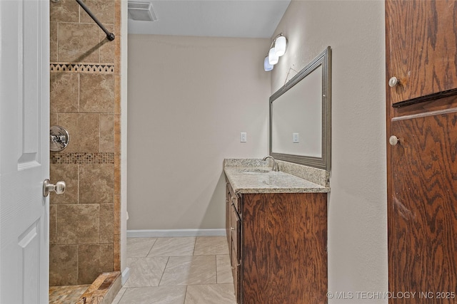 1624 7th NW, Ardmore, OK 73401 - full bathroom with vanity and a tile shower