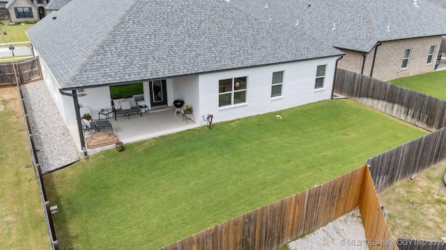 716 E 126th St, Jenks, OK 74037 - back of house with roof with shingles, a patio, a fenced backyard, and stucco siding