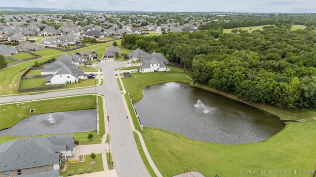 716 E 126th St, Jenks, OK 74037 - aerial overview of property's location with a large body of water and nearby suburban area