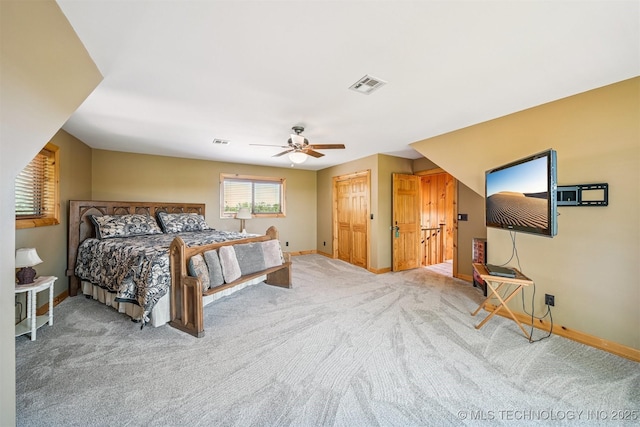 69125 E 252nd Rd, Wyandotte, OK 74370 - carpeted bedroom featuring baseboards and ceiling fan