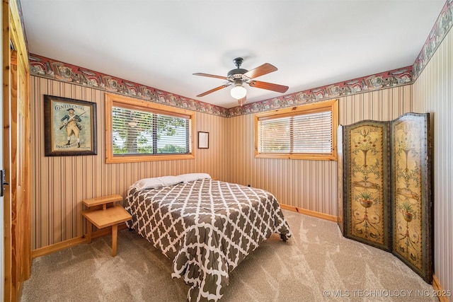 69125 E 252nd Rd, Wyandotte, OK 74370 - bedroom featuring carpet flooring, wallpapered walls, and ceiling fan