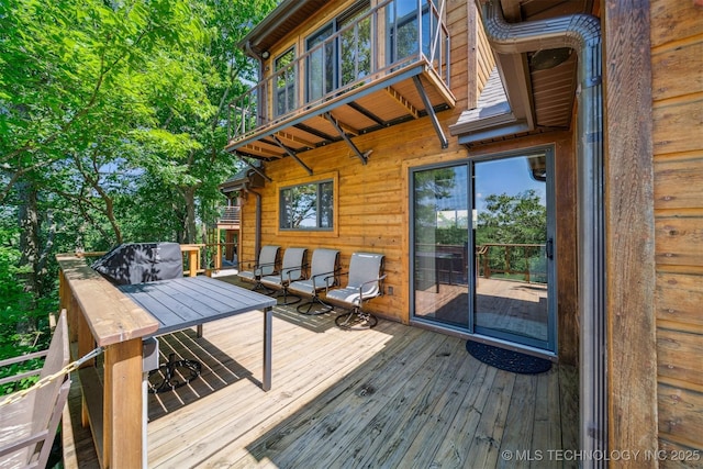 69125 E 252nd Rd, Wyandotte, OK 74370 - wooden deck featuring a grill