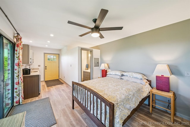 69125 E 252nd Rd, Wyandotte, OK 74370 - bedroom with light wood finished floors, recessed lighting, electric panel, and a ceiling fan