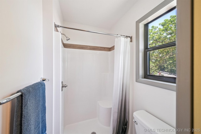 69125 E 252nd Rd, Wyandotte, OK 74370 - bathroom with toilet and a shower with curtain