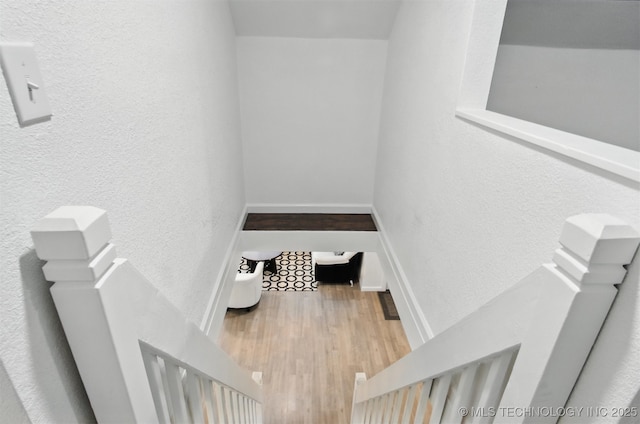 27719 S 610th Rd, Bunch, OK 74931 - stairway with a textured wall and wood finished floors