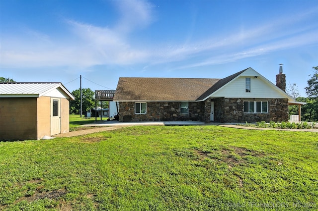 27719 S 610th Rd, Bunch, OK 74931 - view of front of property with stone siding, a front yard, and a chimney