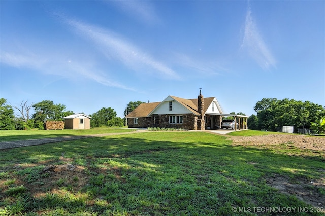 27719 S 610th Rd, Bunch, OK 74931 - rear view of property featuring a storage unit, stone siding, a chimney, and a yard
