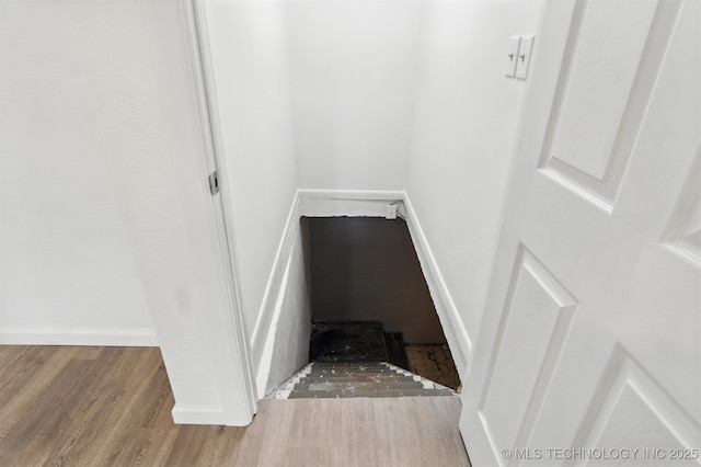 27719 S 610th Rd, Bunch, OK 74931 - stairway featuring wood finished floors and baseboards