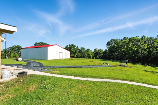 27719 S 610th Rd, Bunch, OK 74931 - view of green lawn with a pole building and an outbuilding