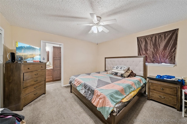 8817 E 2nd St, Tulsa, OK 74112 - bedroom featuring light carpet, a textured ceiling, and ceiling fan