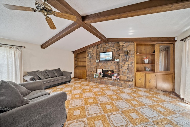 8817 E 2nd St, Tulsa, OK 74112 - living room with a stone fireplace, built in shelves, a textured ceiling, and ceiling fan