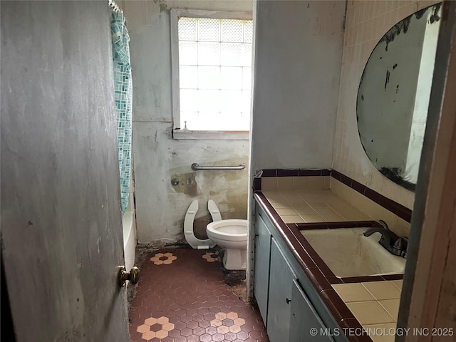 5756 E 28th St, Tulsa, OK 74114 - bathroom with vanity and shower / tub combo with curtain