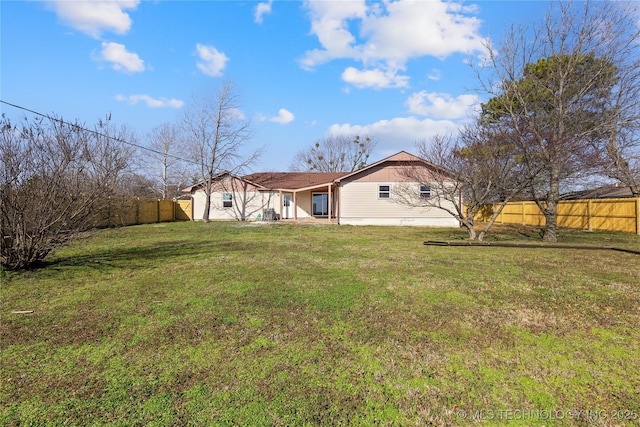 14400 County Road 3490, Ada, OK 74820 - back of house with a fenced backyard