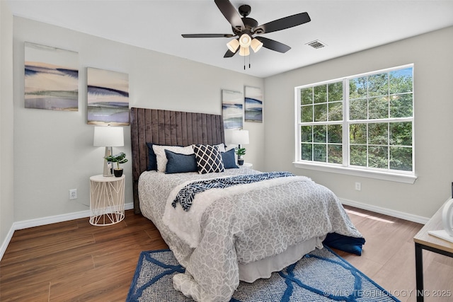 2117 Western Dr, Skiatook, OK 74070 - bedroom featuring wood finished floors and a ceiling fan