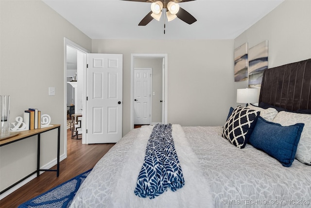 2117 Western Dr, Skiatook, OK 74070 - bedroom featuring wood finished floors and a ceiling fan