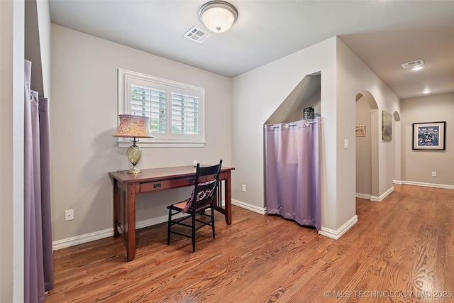 9319 S Indianapolis Ave, Tulsa, OK 74137 - office area with wood finished floors and arched walkways