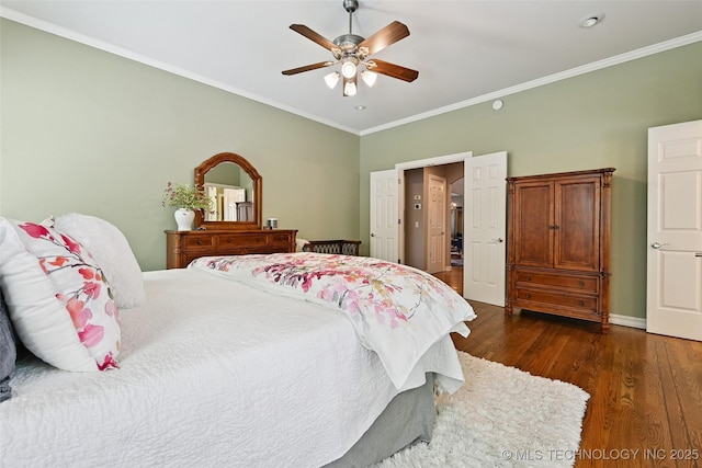 9319 S Indianapolis Ave, Tulsa, OK 74137 - bedroom featuring dark wood-style floors, crown molding, and a ceiling fan