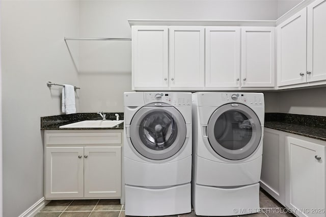 9319 S Indianapolis Ave, Tulsa, OK 74137 - laundry area featuring cabinet space, independent washer and dryer, and tile patterned floors