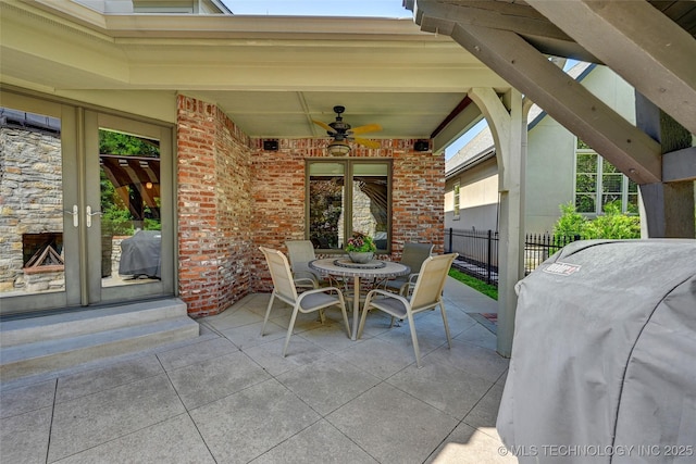 9319 S Indianapolis Ave, Tulsa, OK 74137 - view of patio / terrace featuring french doors, area for grilling, and a ceiling fan