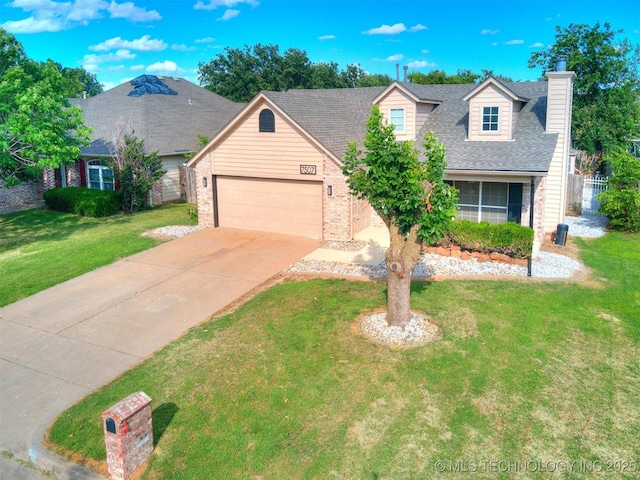 7507 S 92nd E Ave, Tulsa, OK 74133 - view of front facade featuring brick siding, an attached garage, concrete driveway, a front yard, and a chimney