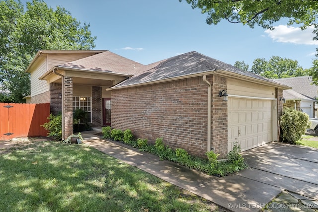 5117 E 89th St, Tulsa, OK 74137 - single story home featuring brick siding, an attached garage, roof with shingles, and concrete driveway