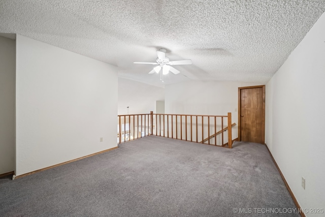 5117 E 89th St, Tulsa, OK 74137 - spare room featuring ceiling fan, lofted ceiling, and carpet floors