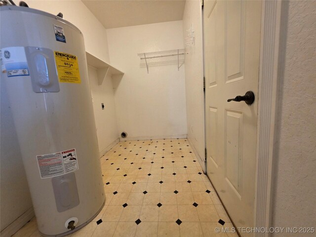 2202 Sycamore Rd, Mcalester, OK 74501 - laundry room with water heater, hookup for an electric dryer, and light floors