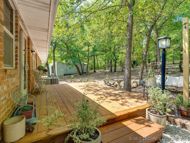 17027 County Road 3547, Ada, OK 74820 - deck featuring an outbuilding