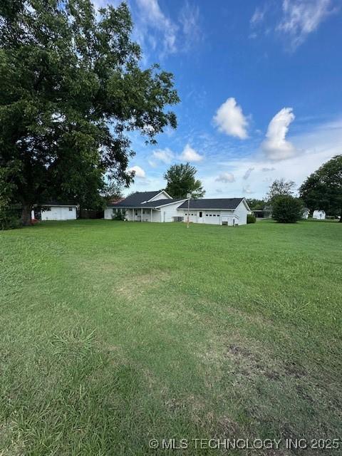 717 N Burns, Holdenville, OK 74848 - view of green lawn
