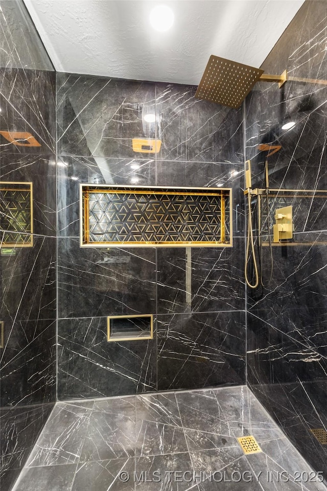 16355 County Road 1586, Ada, OK 74820 - bathroom with marble finish floors and tiled shower
