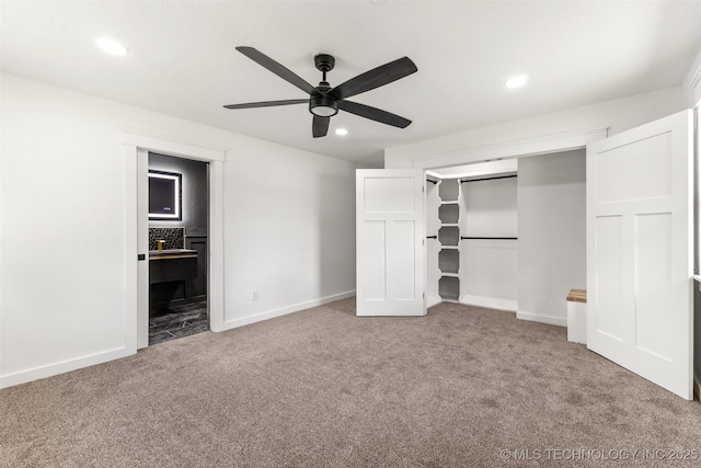 16355 County Road 1586, Ada, OK 74820 - unfurnished bedroom featuring carpet, recessed lighting, ensuite bath, a ceiling fan, and a closet