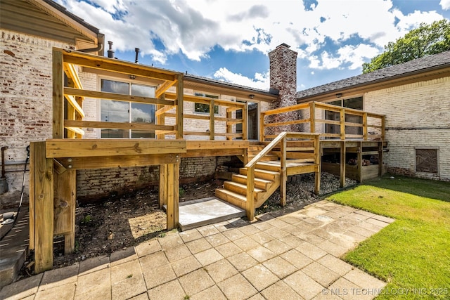 3743 E 59th Pl, Tulsa, OK 74135 - rear view of house with a wooden deck, a chimney, stairs, and a patio
