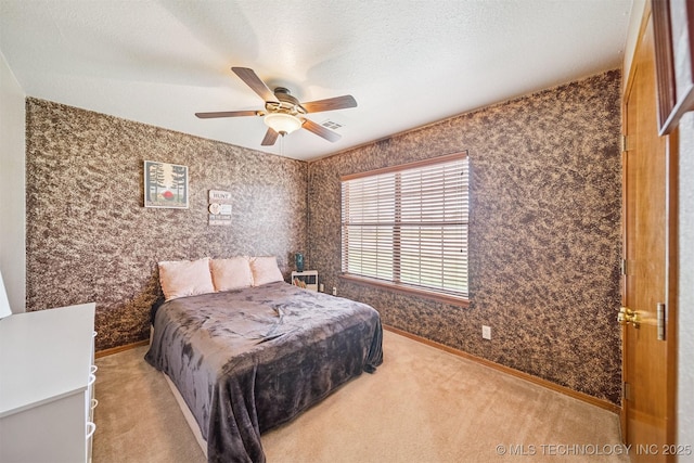 2 Ketchum St, Chelsea, OK 74016 - bedroom featuring carpet floors, ceiling fan, and wallpapered walls