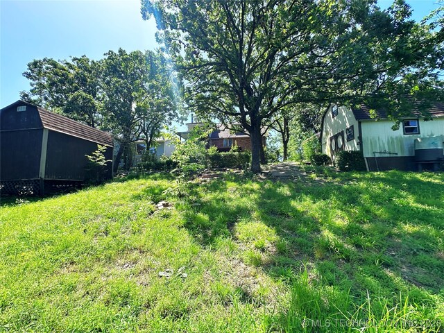 5371 Hilltop, Mcalester, OK 74501 - view of yard with an outbuilding