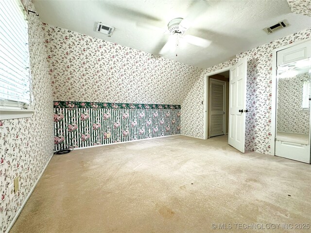 5371 Hilltop, Mcalester, OK 74501 - additional living space with wallpapered walls, ceiling fan, and carpet floors