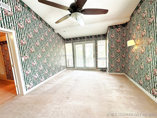 5371 Hilltop, Mcalester, OK 74501 - carpeted empty room featuring wallpapered walls and a ceiling fan