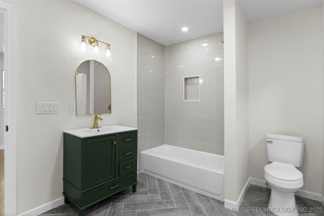 1103 S Choctaw Pl, Claremore, OK 74017 - bathroom featuring vanity, washtub / shower combination, and recessed lighting