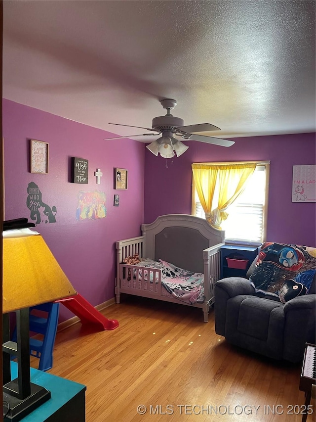 2509 Canterbury Ave, Muskogee, OK 74403 - bedroom featuring wood finished floors and a ceiling fan