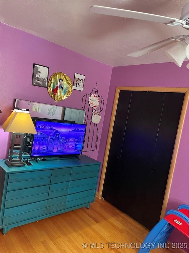 2509 Canterbury Ave, Muskogee, OK 74403 - bedroom with wood finished floors and a ceiling fan