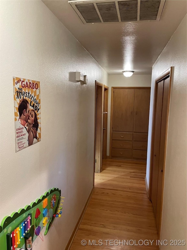 2509 Canterbury Ave, Muskogee, OK 74403 - hall with light wood-style floors and baseboards