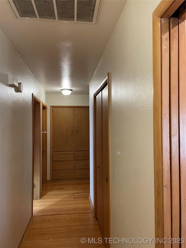 2509 Canterbury Ave, Muskogee, OK 74403 - hall with light wood-style floors and baseboards