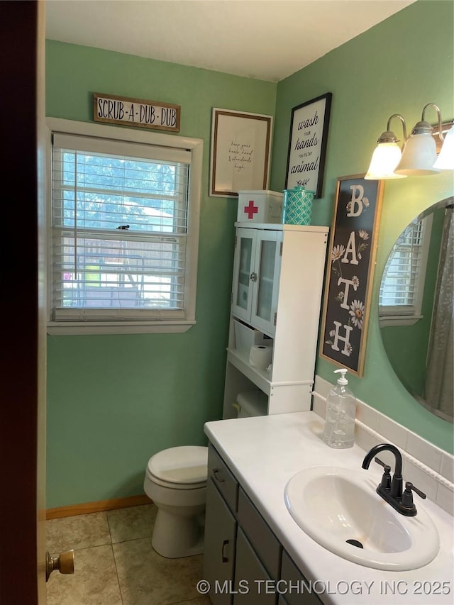 2509 Canterbury Ave, Muskogee, OK 74403 - bathroom with vanity and tile patterned flooring