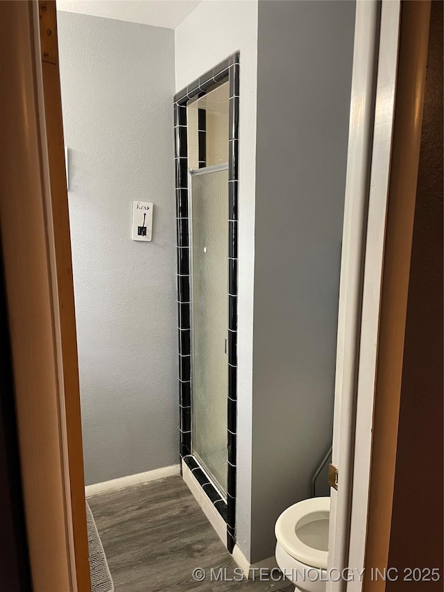 2509 Canterbury Ave, Muskogee, OK 74403 - bathroom with toilet and wood finished floors