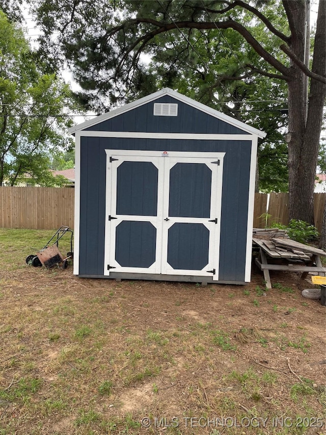 2509 Canterbury Ave, Muskogee, OK 74403 - view of shed with a fenced backyard