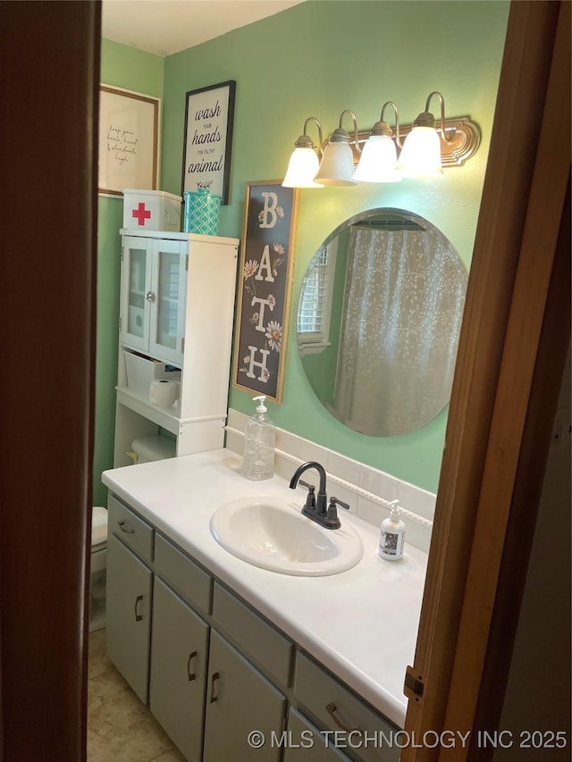 2509 Canterbury Ave, Muskogee, OK 74403 - bathroom with vanity and toilet
