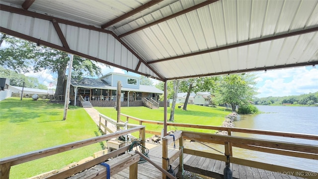 1060 Lakeside Dr, Fort Towson, OK 74735 - dock featuring a water view and a lawn