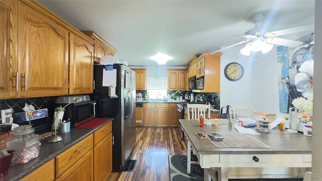 1060 Lakeside Dr, Fort Towson, OK 74735 - kitchen featuring tasteful backsplash, stainless steel appliances, ceiling fan, and dark wood finished floors