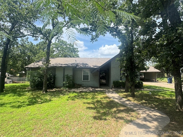 1516 Timber Ridge Dr, Cleveland, OK 74020 - view of front of home with a front yard and brick siding